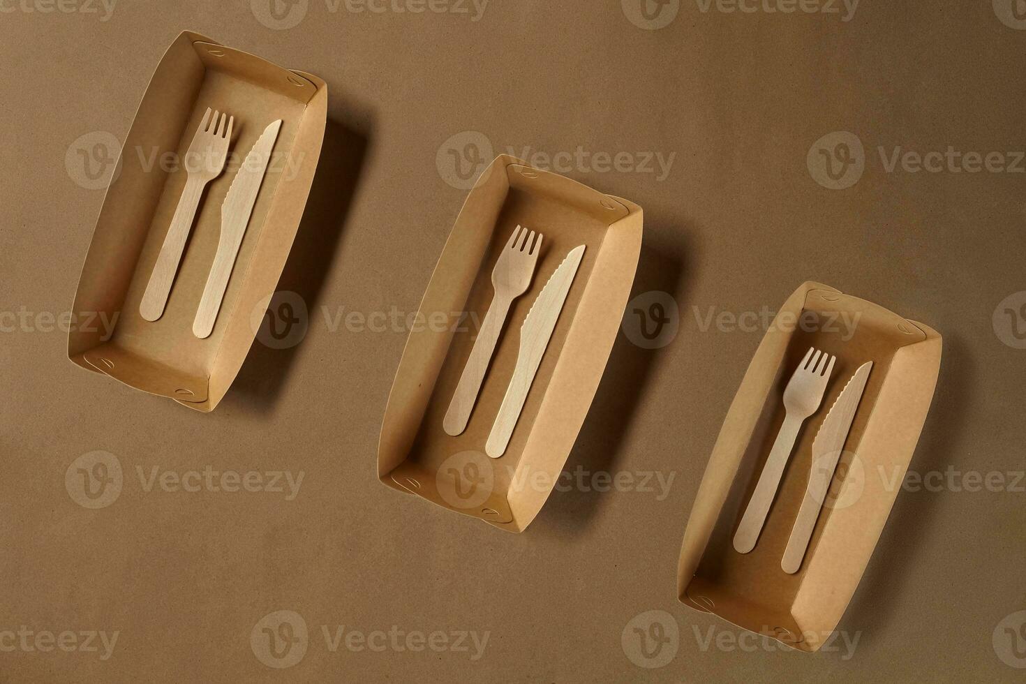 Eco friendly disposable tableware. Biodegradable craft dishes. Recycling concept. Also used in fast food, restaurants, takeaways, picnics. Close-up. photo