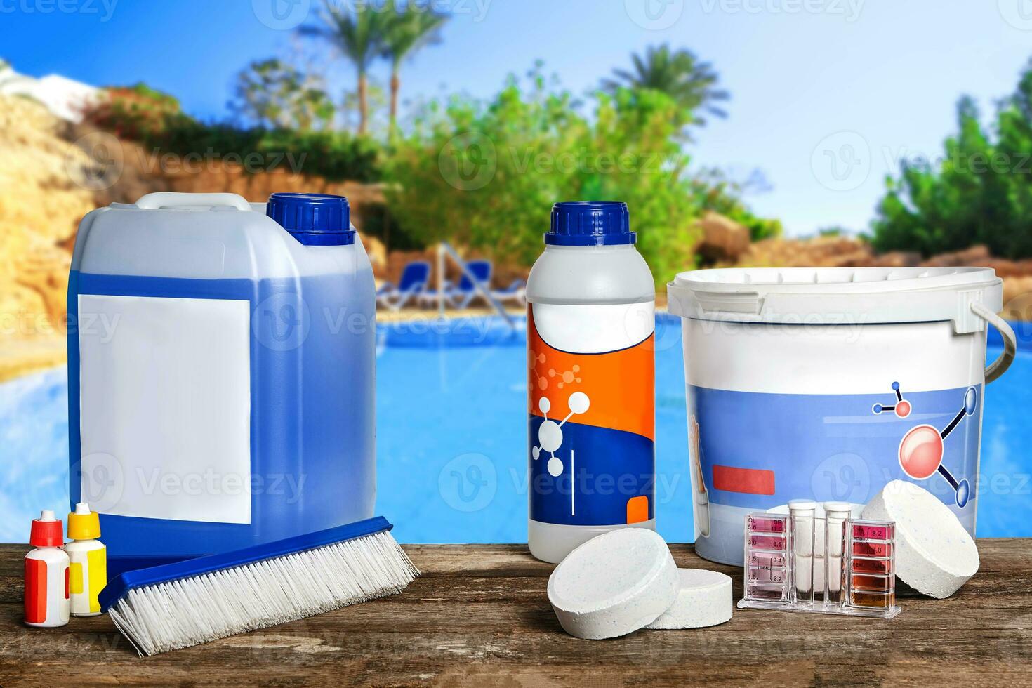 Equipment with chemical cleaning products and tools for the maintenance of the swimming pool. photo