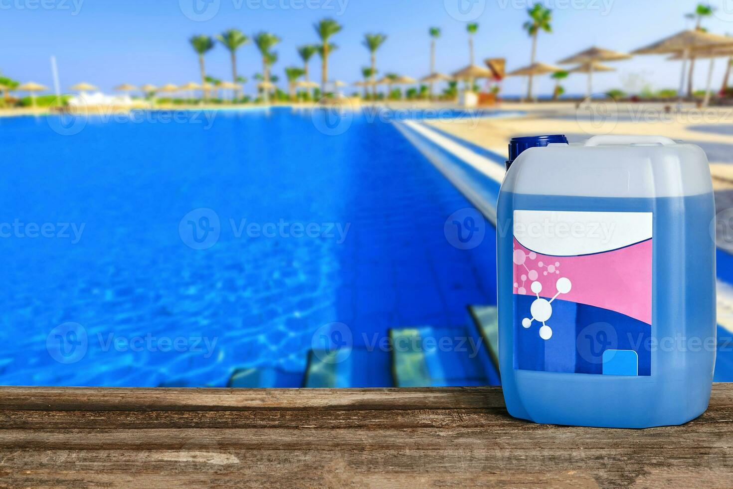Equipment with chemical cleaning products and tools for the maintenance of the swimming pool. photo