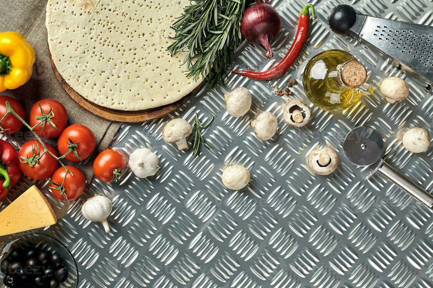 Ingredients for cooking pizza on metal table, top view photo