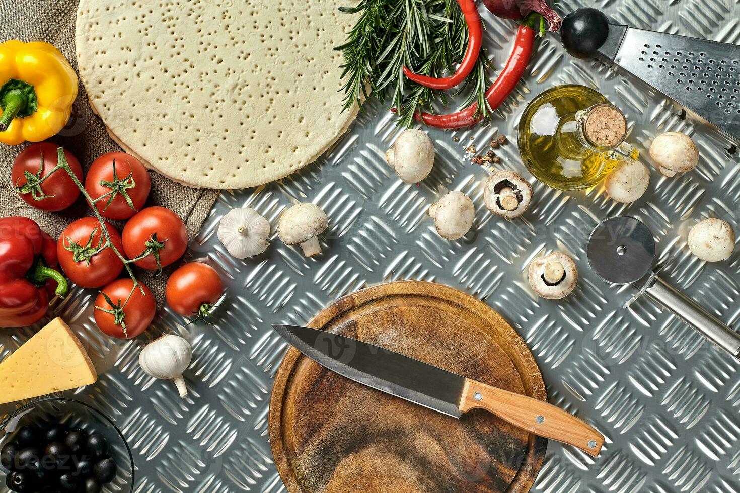 Ingredients for cooking pizza on metal table, top view photo