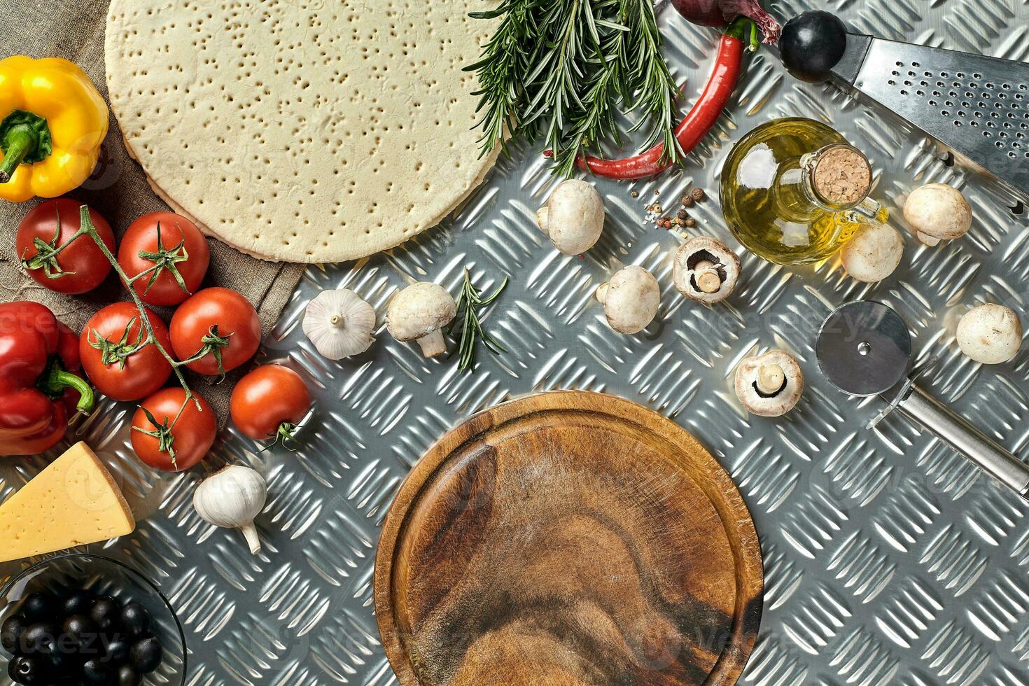 Ingredients for cooking pizza on metal table, top view photo