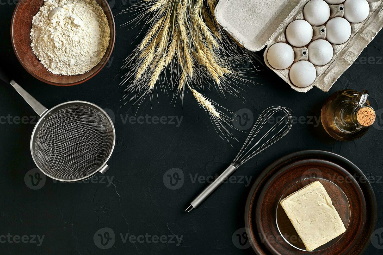 Dough preparation recipe bread, pizza or pie making ingredients, food flat lay on kitchen table background. Working with butter, yeast, flour, eggs, oil. Pastry or bakery cooking. photo