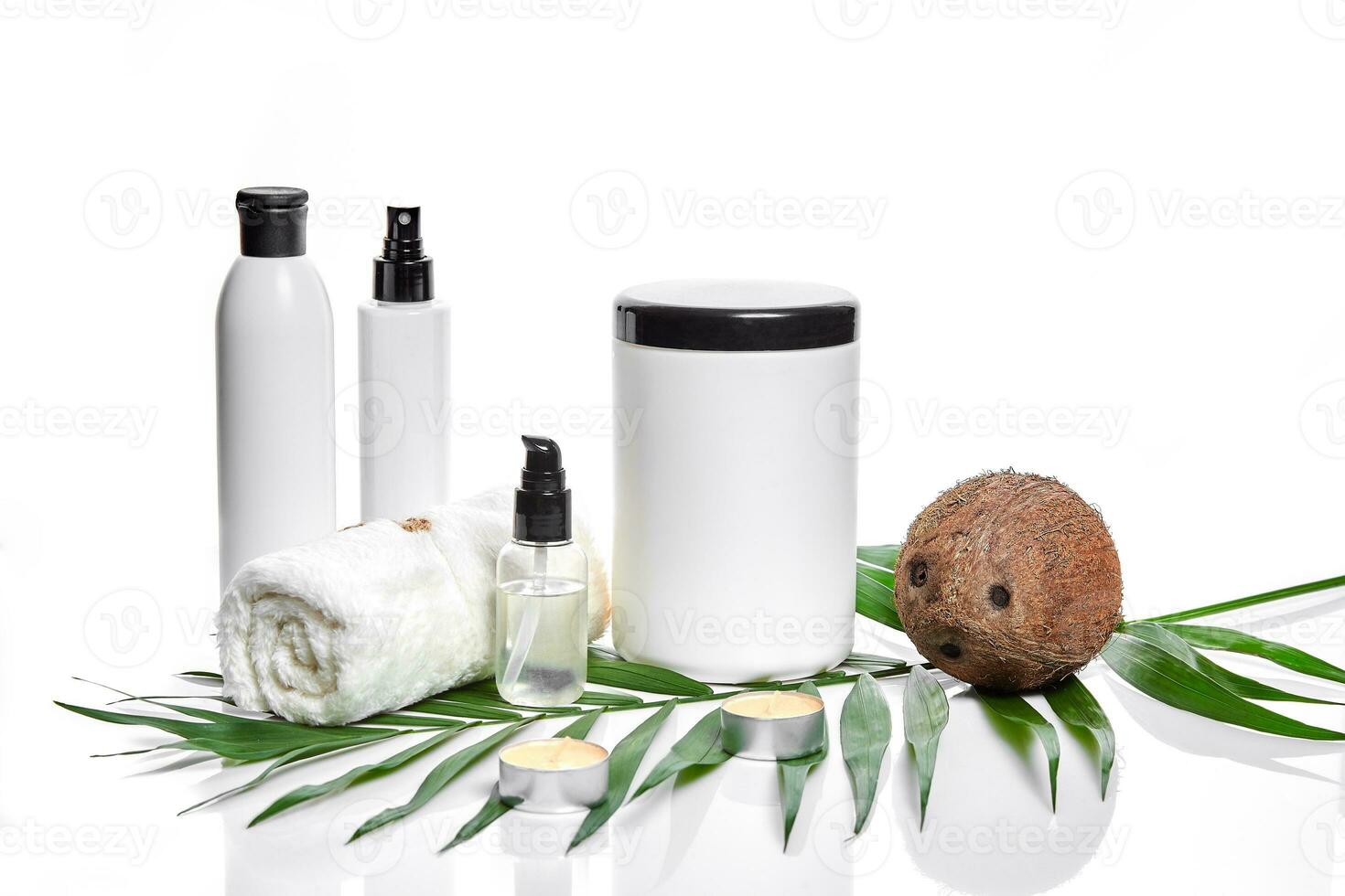 Organic cosmetics with coconut on white background. photo