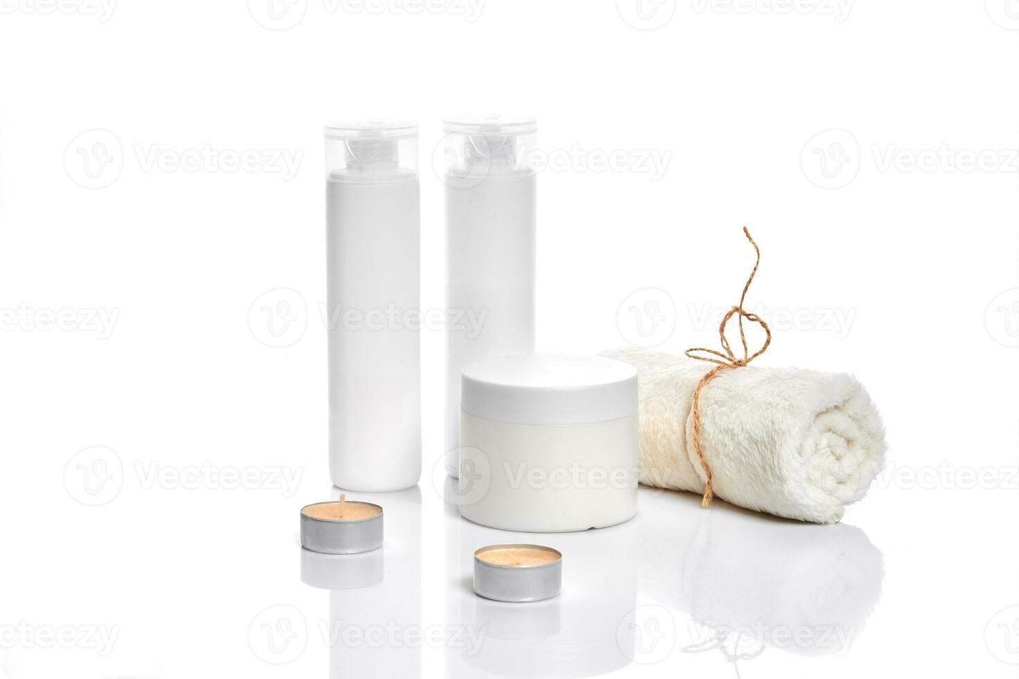 Set of cosmetic products in white containers on light background. photo