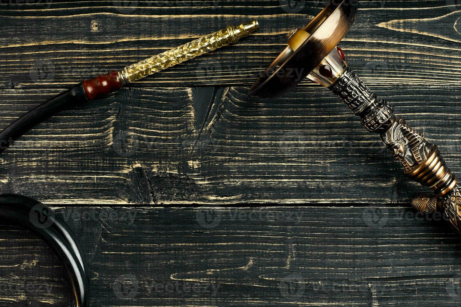 Dismantled parts of hookah on wooden background. photo