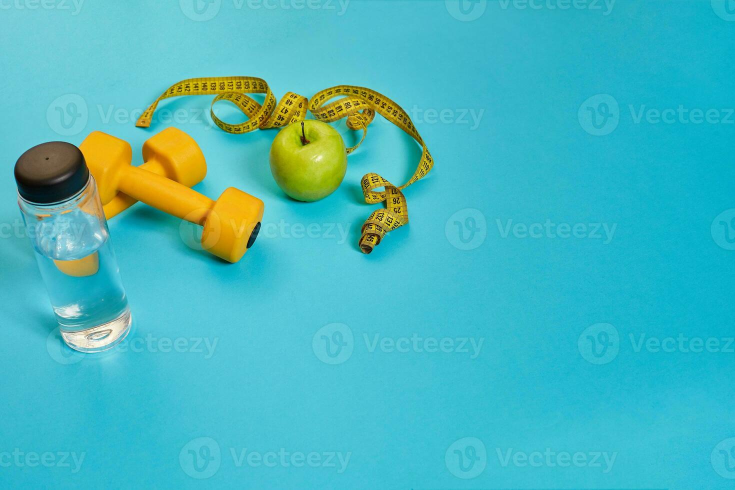 Dumbbells, centimeter, green apple, weight loss, healthy eating, healthy lifestyle concept photo