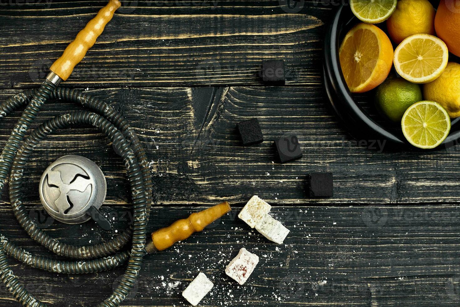 Arabic hookah with a tobacco flavor of a mixture of citruses photo