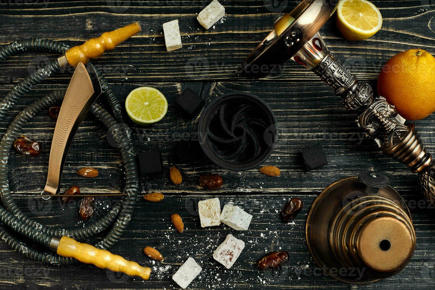Arabic hookah with a tobacco flavor of a mixture of citruses photo