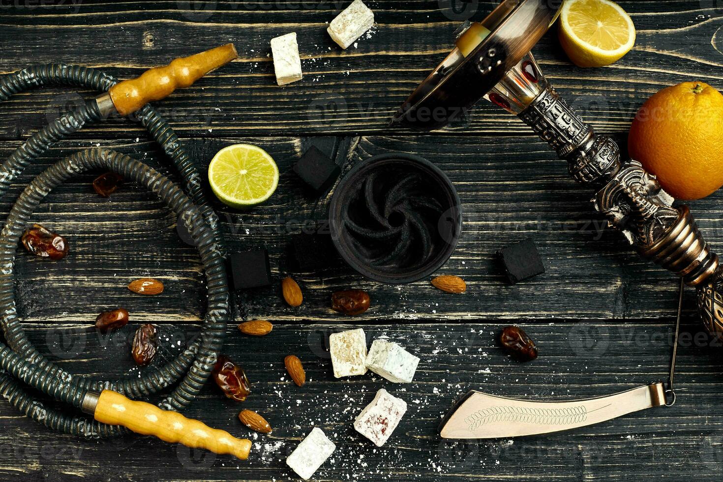 Arabic hookah with a tobacco flavor of a mixture of citruses photo