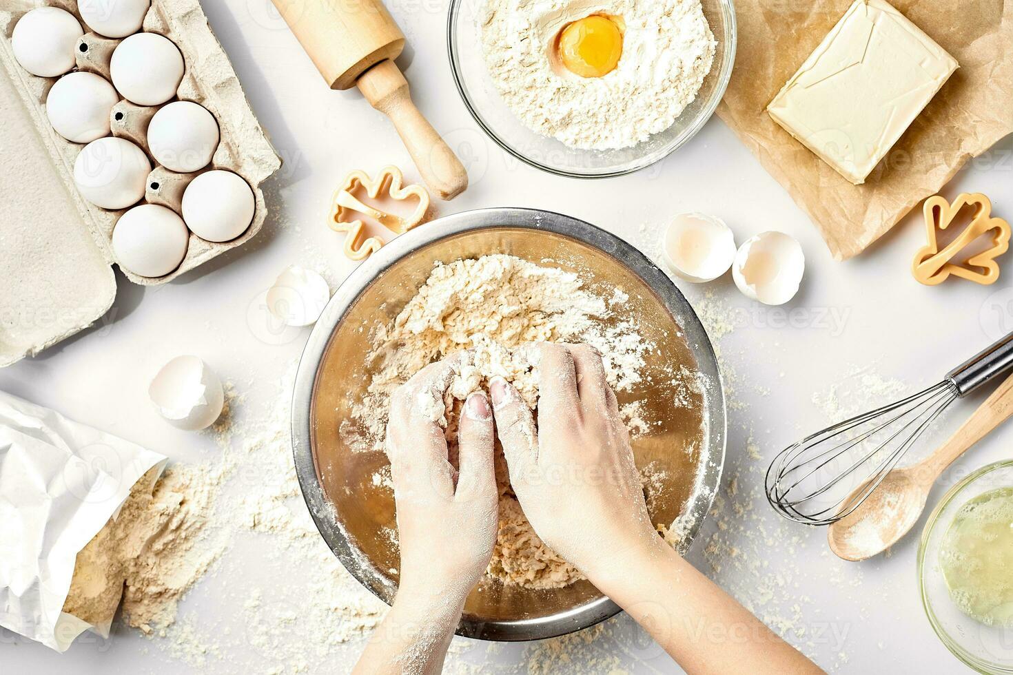 Baker preparing to knead the dough, top view. Cooking, bakery concept photo