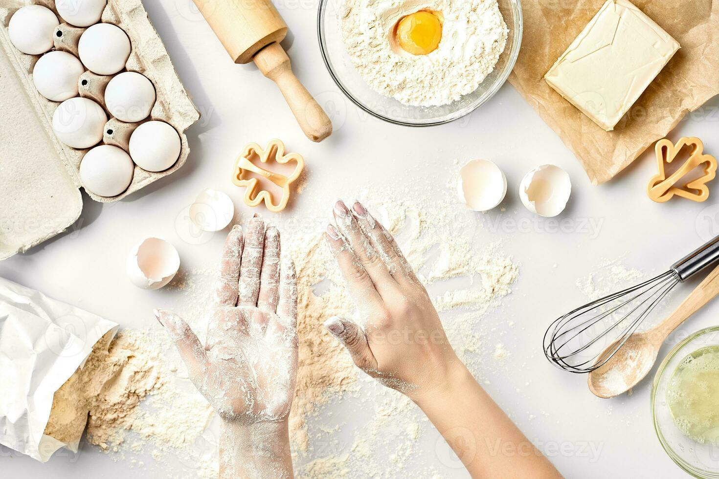 Baker preparing to knead the dough, top view. Cooking, bakery concept photo