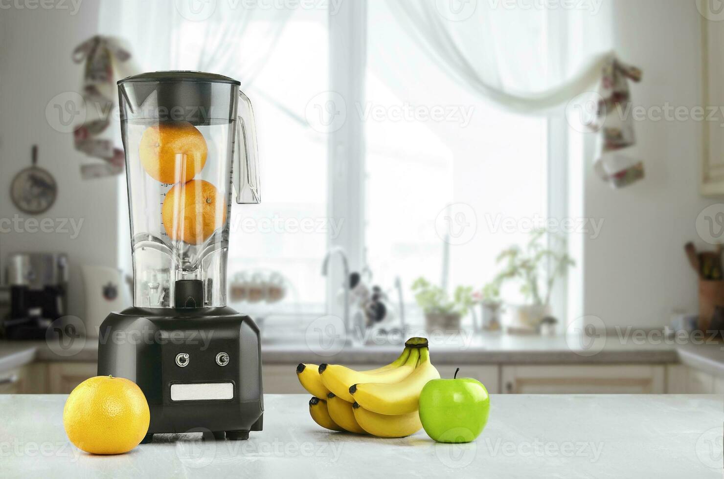 Blender, fruits and kitchen space photo