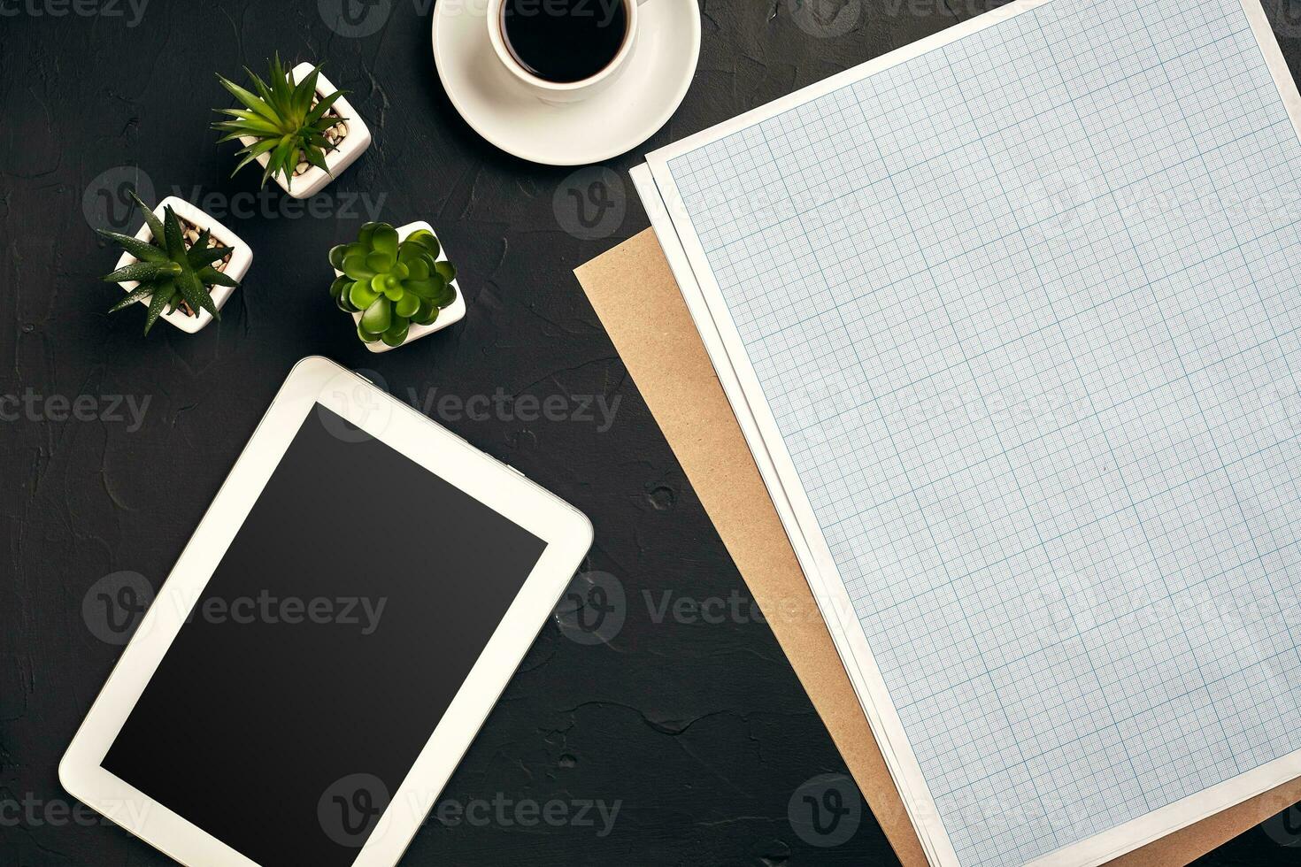 Architect's work tools on black background. Top view photo