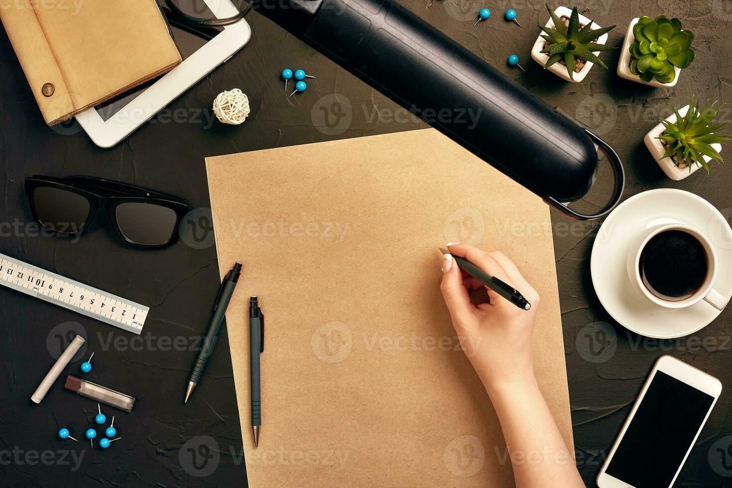 Architect working on blueprint. Architects workplace - architectural project, blueprints, tablet pc. Engineering tools. Top view photo