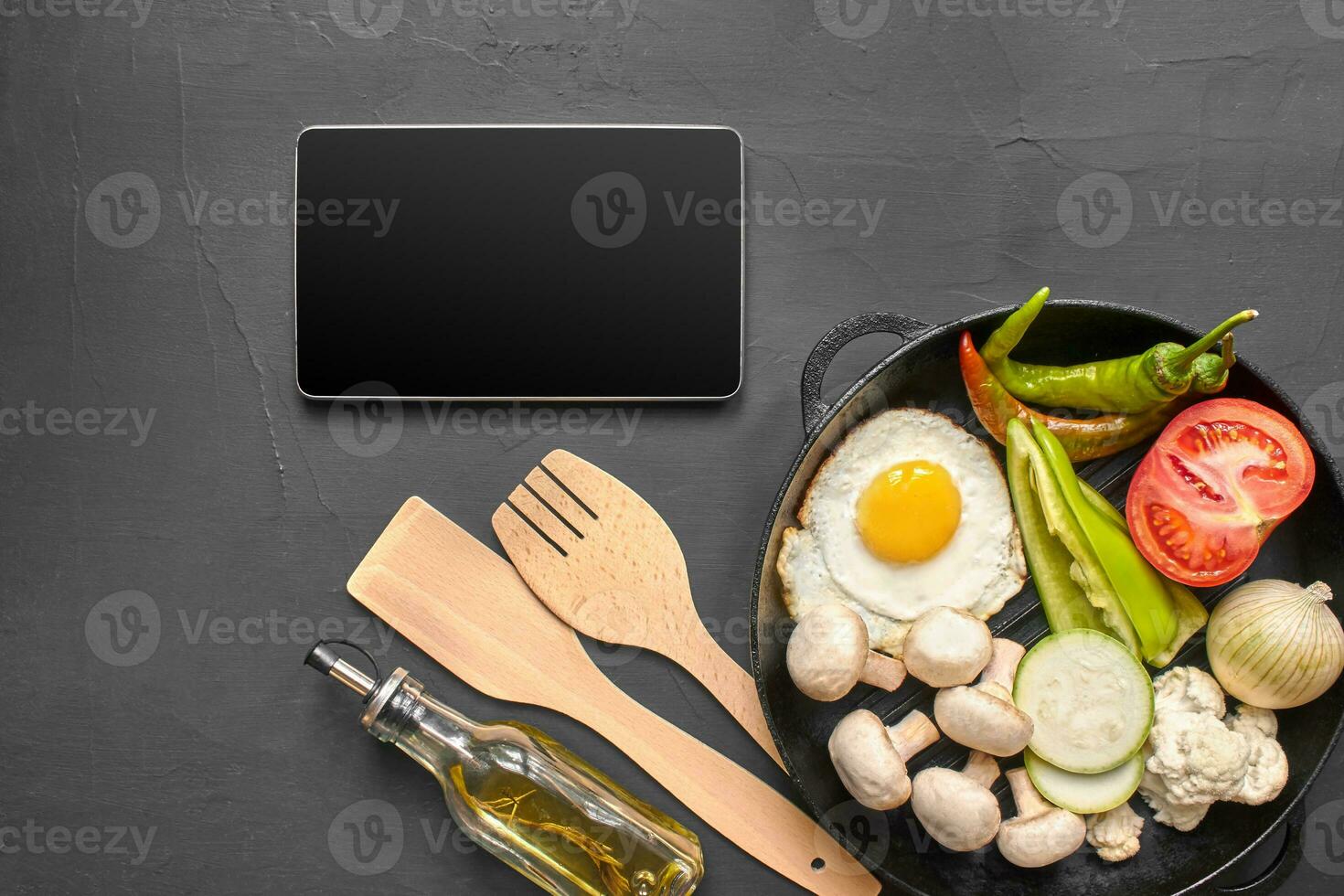 Top view of a fresh vegetables for healthy nutrition. Black background with copyspace. photo