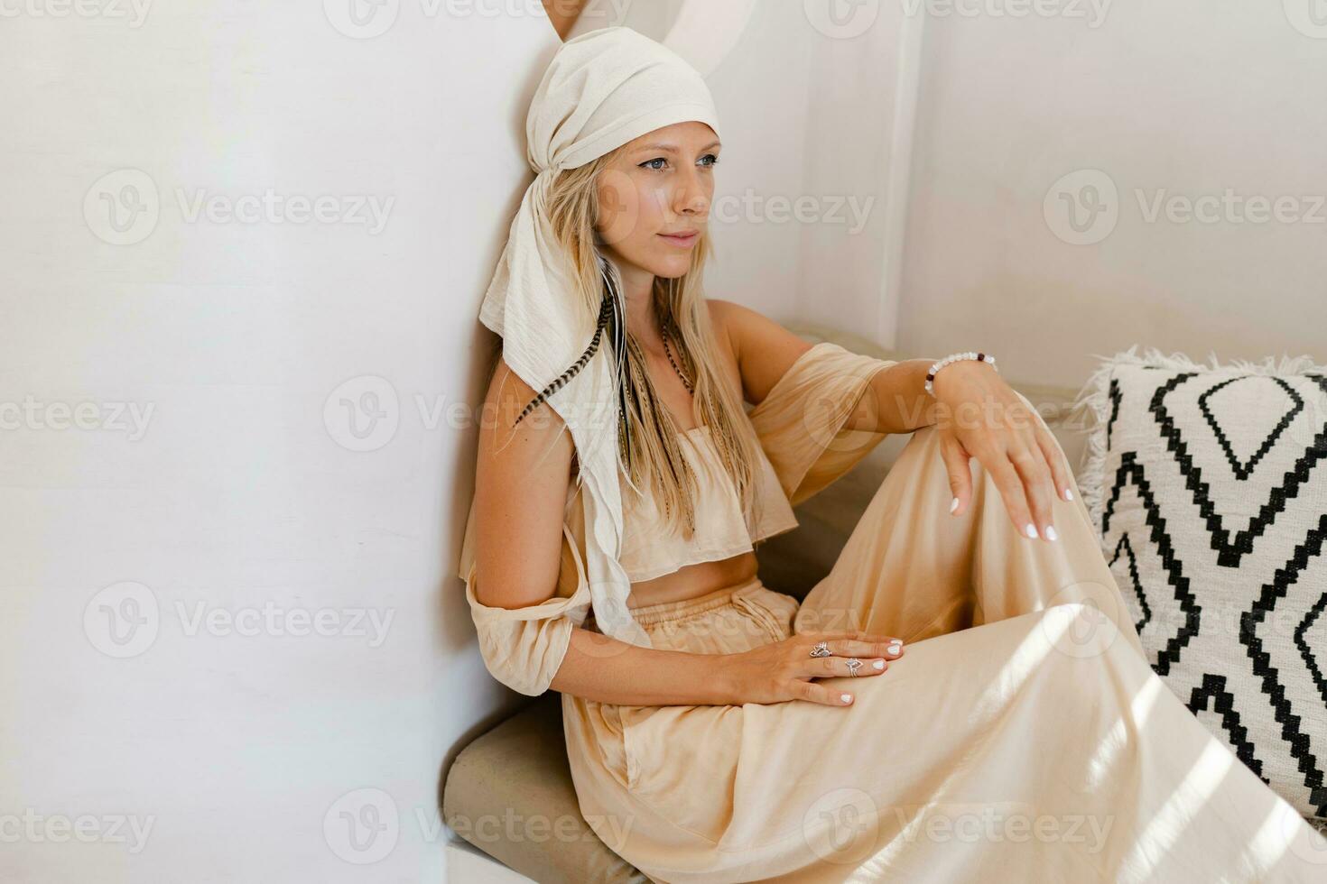 Fashion photo of beautiful young stylish woman wearing turban with oriental accessories