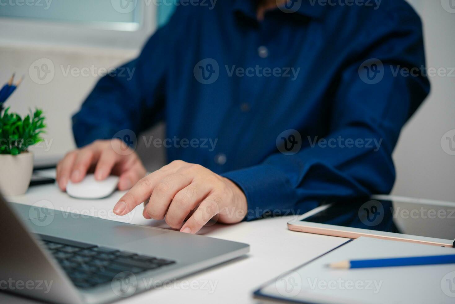 businessman using laptop search information and social media internet online photo