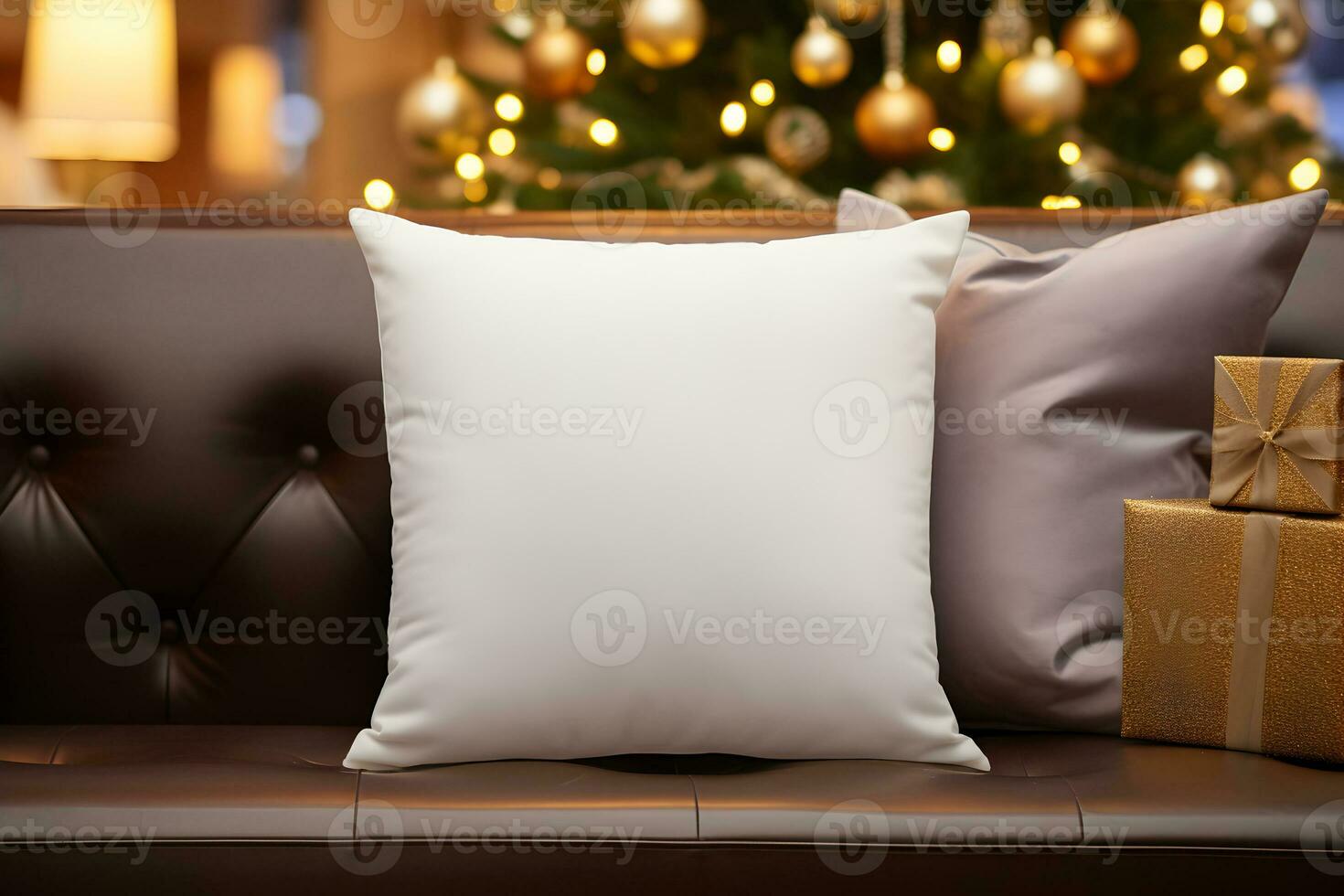 Blank white pillow mockup on black leather sofa with christmas tree and lights bokeh background. Holiday template composition with decoration. Copy space. photo