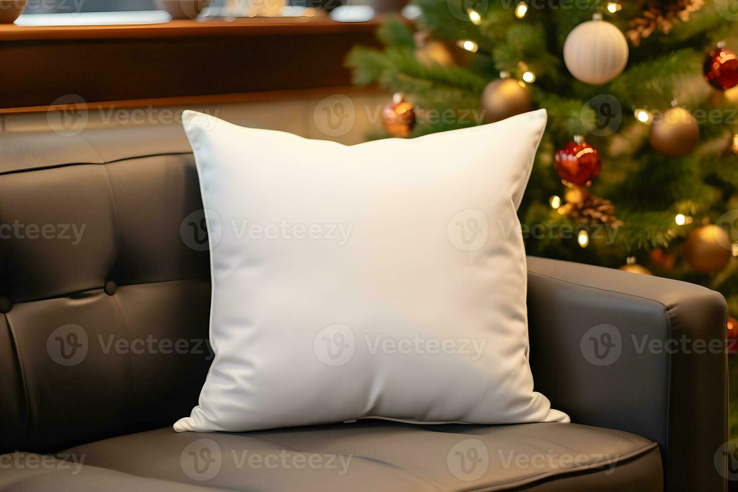 Blank white pillow mockup on black leather sofa with christmas tree and lights bokeh background. Holiday template composition with decoration. Copy space. photo
