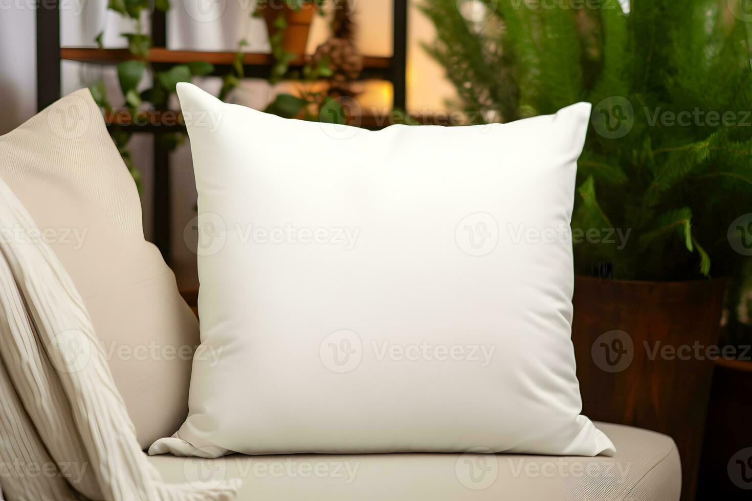 Blank white pillow mockup on sofa with house plants and home interior background. Home template composition with decoration. Copy space. photo