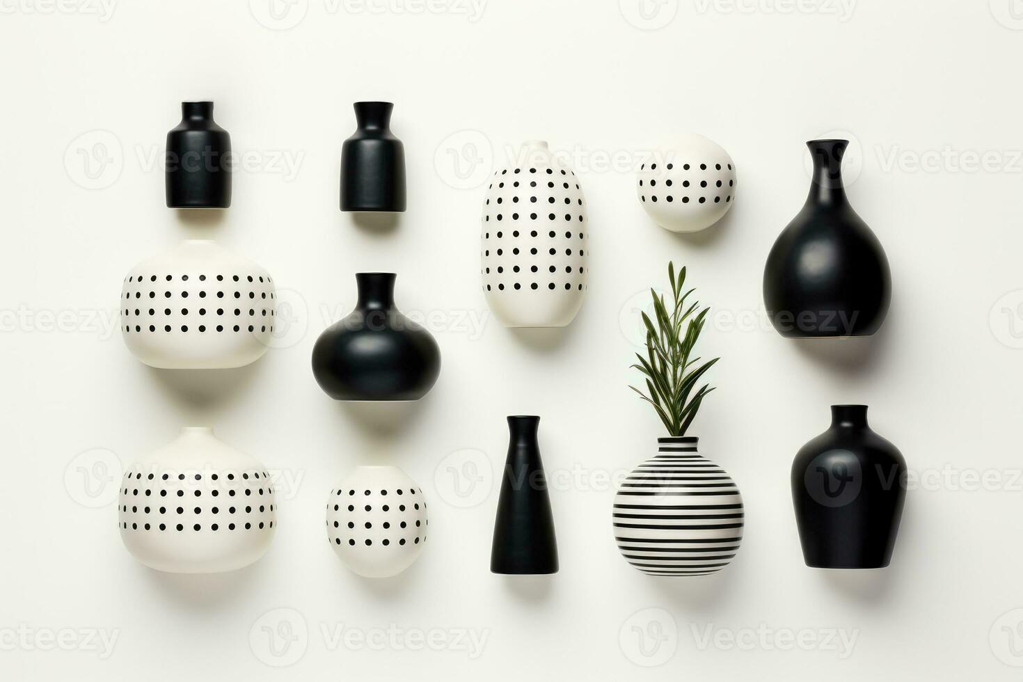 Monochrome minimalist decor items arranged tastefully isolated on a white background photo