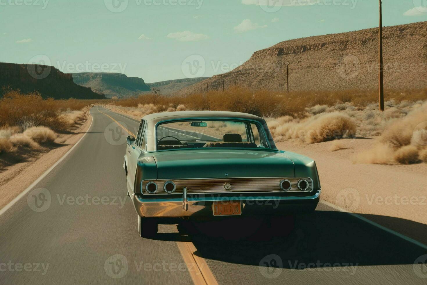Vintage green car driving on mountain desert road. Generate ai photo