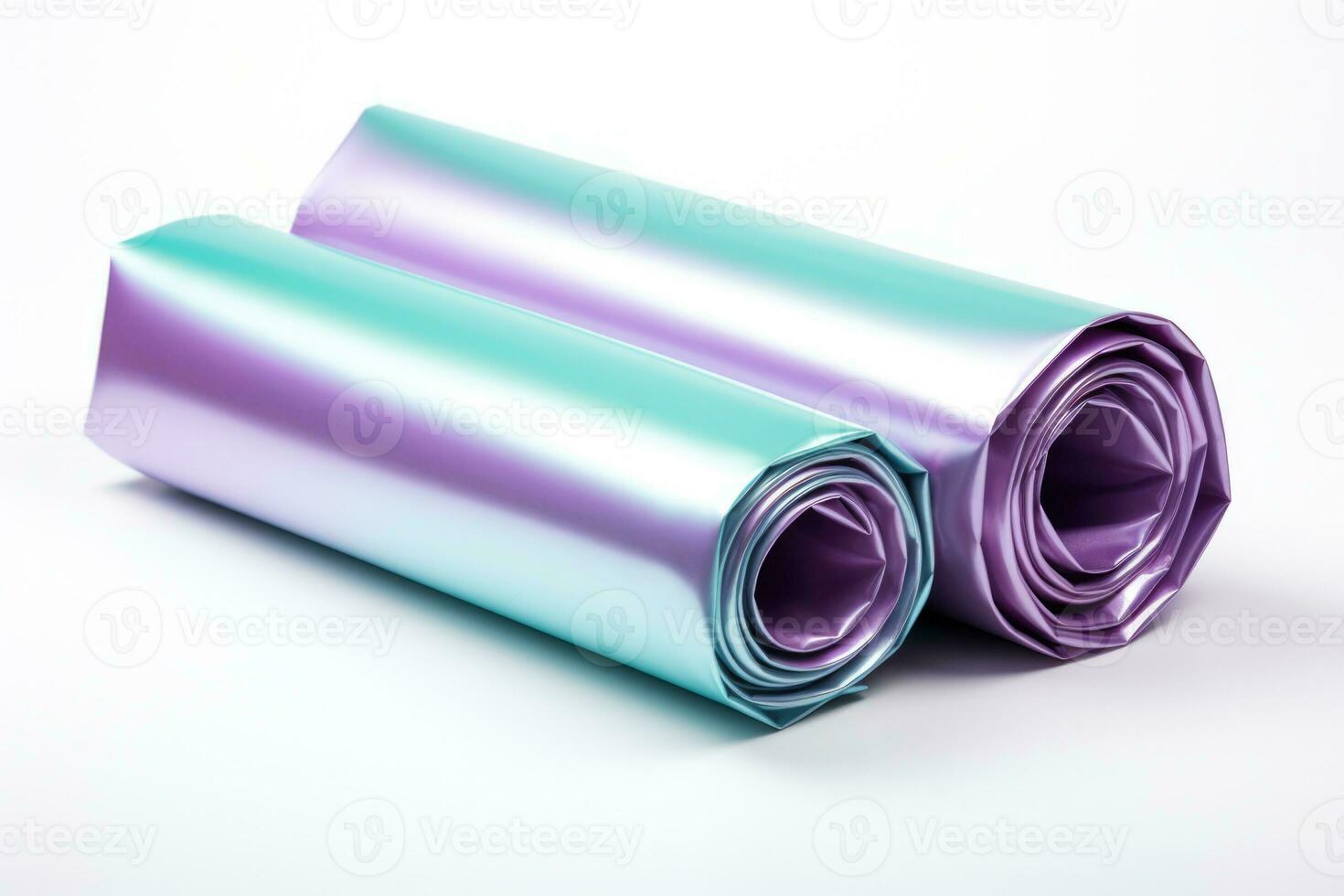 A roll of shiny gift wrapping paper isolated on a white background photo