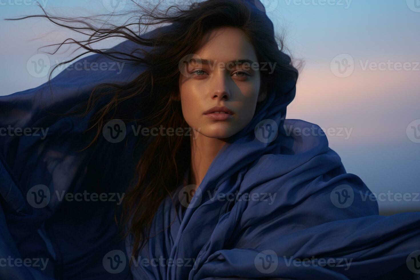 Model in twilight of career reflects captured in deep blue and soft purple hues photo