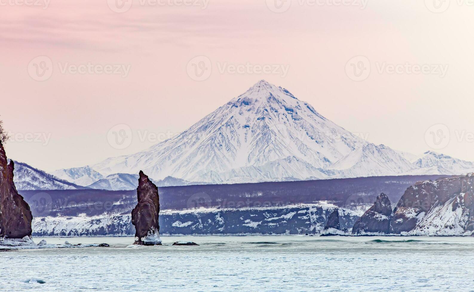 Vilyuchinsky volcano and avacha bay in winter on kamchatka peninsula photo