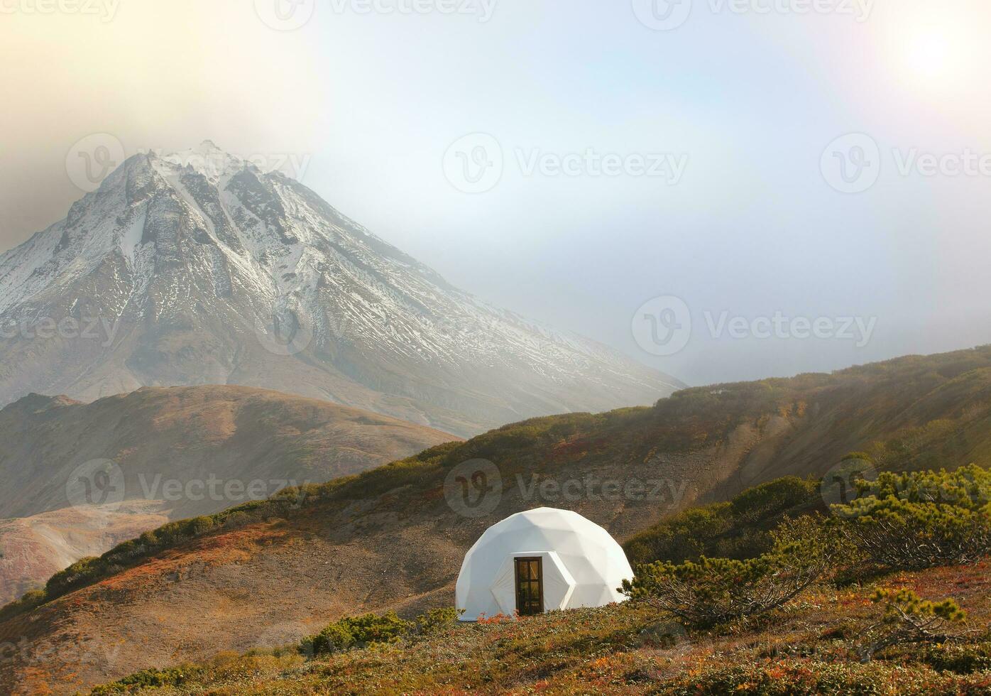 glamping on volcano in kamchatka peninsula in sun light photo