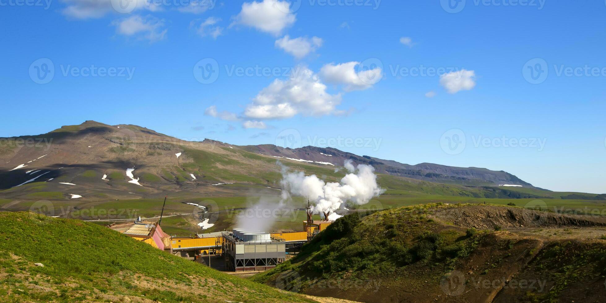 Fan cooling towers of Mutnovskaya Geothermal Power Station using geothermal energy to produce electricity. photo