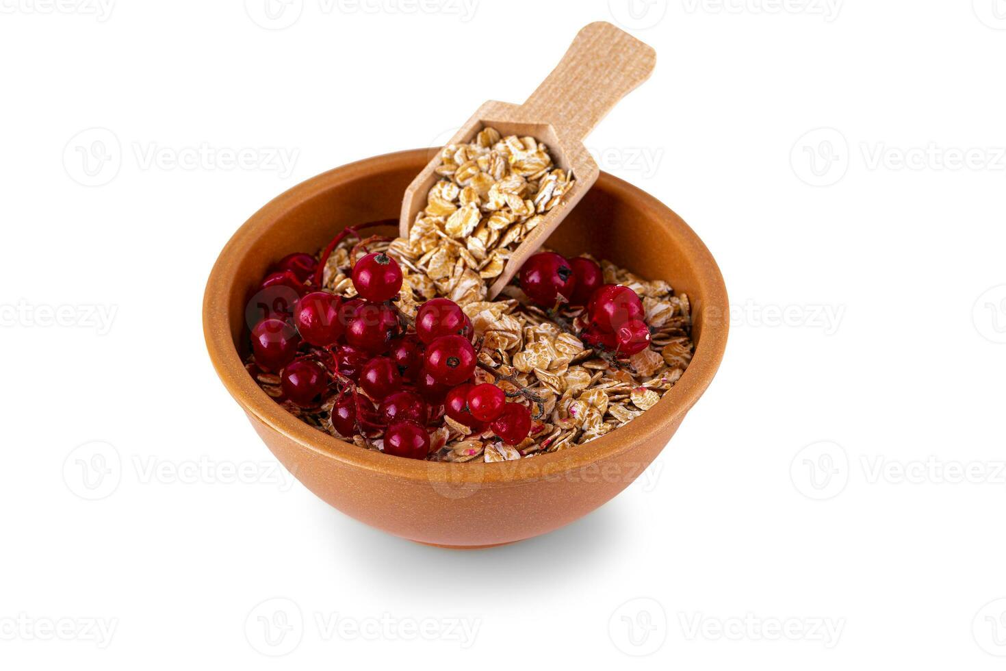 oat flakes with Red currant in the Cup isolated on white photo