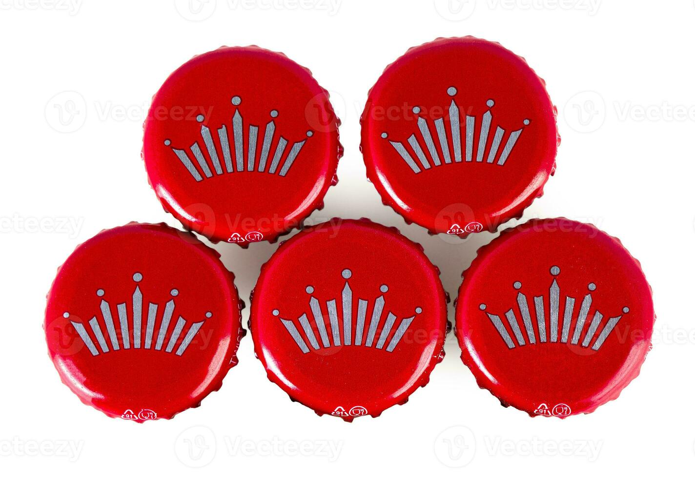 The Red beer caps Bud isolated on white photo