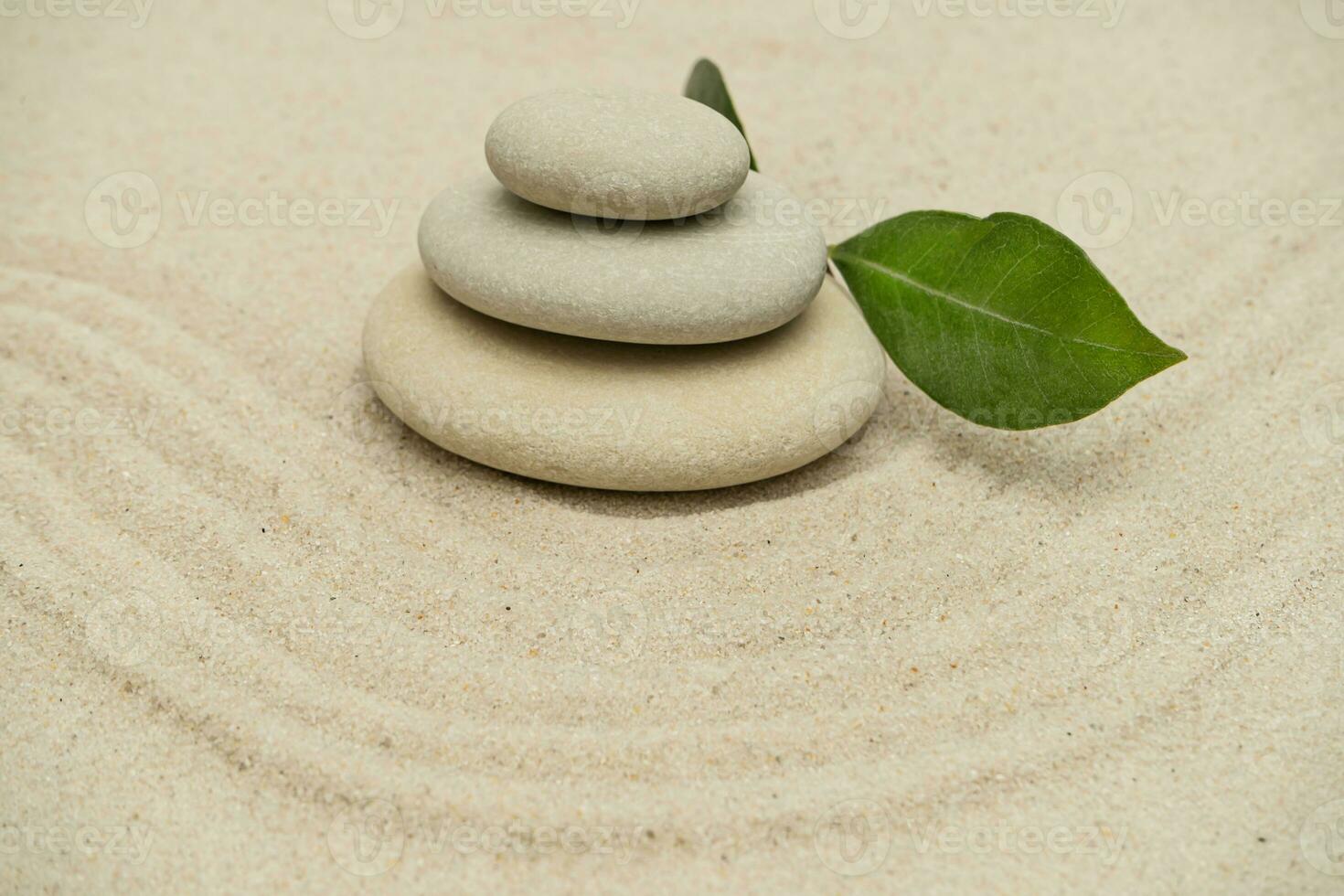 Sand garden meditation stones. Stones and lines. Concept of zen, balance, harmony. photo