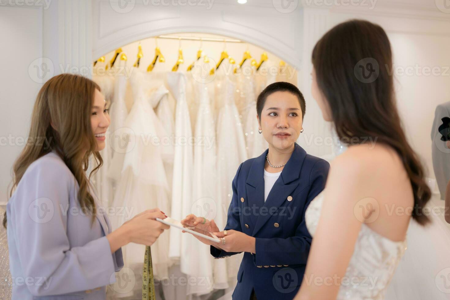 LGBT couples are choosing wedding gowns, with designers advising them on how to make them suitable and lovely for the bride. photo