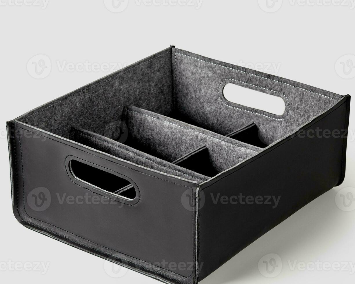 Black leather storage box with felt lined inner dividers photo