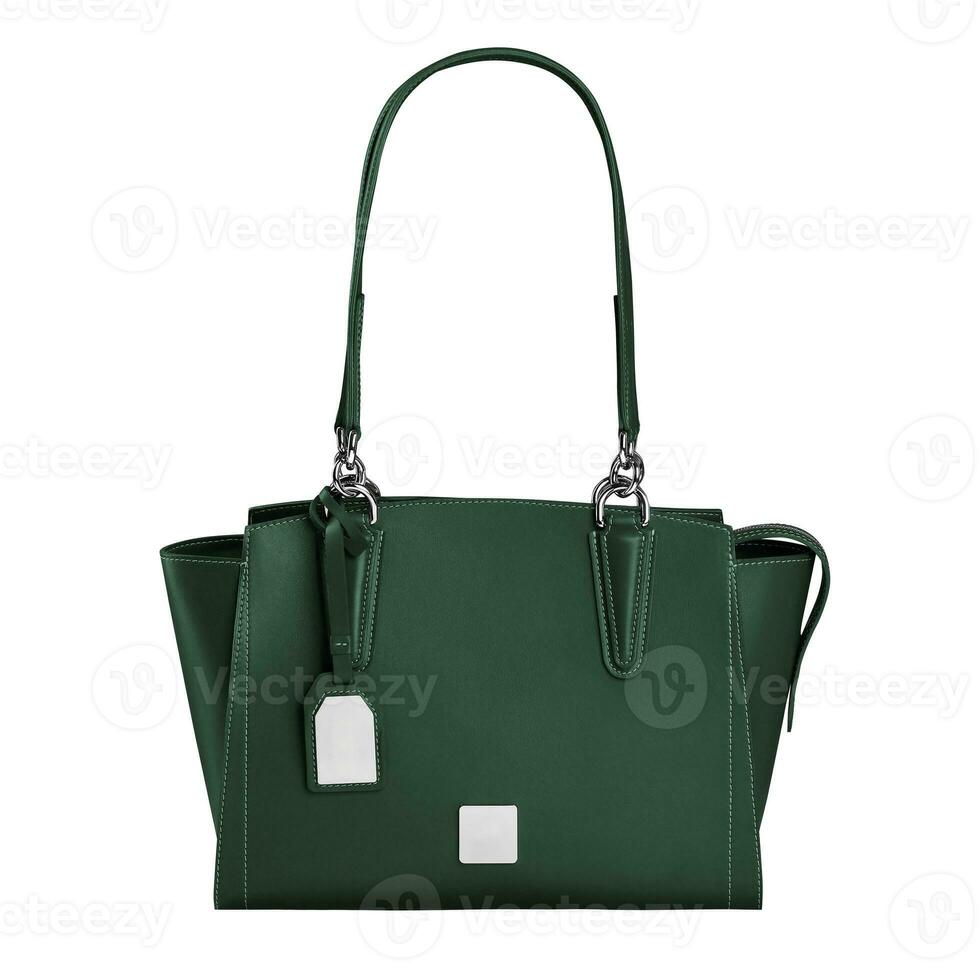Practical dark green leather handbag with two handles isolated on white photo