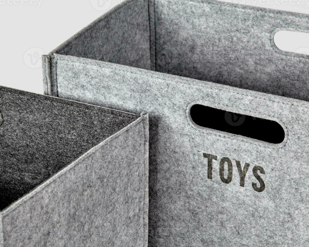 Gray felt boxes for storing toys with handles photo