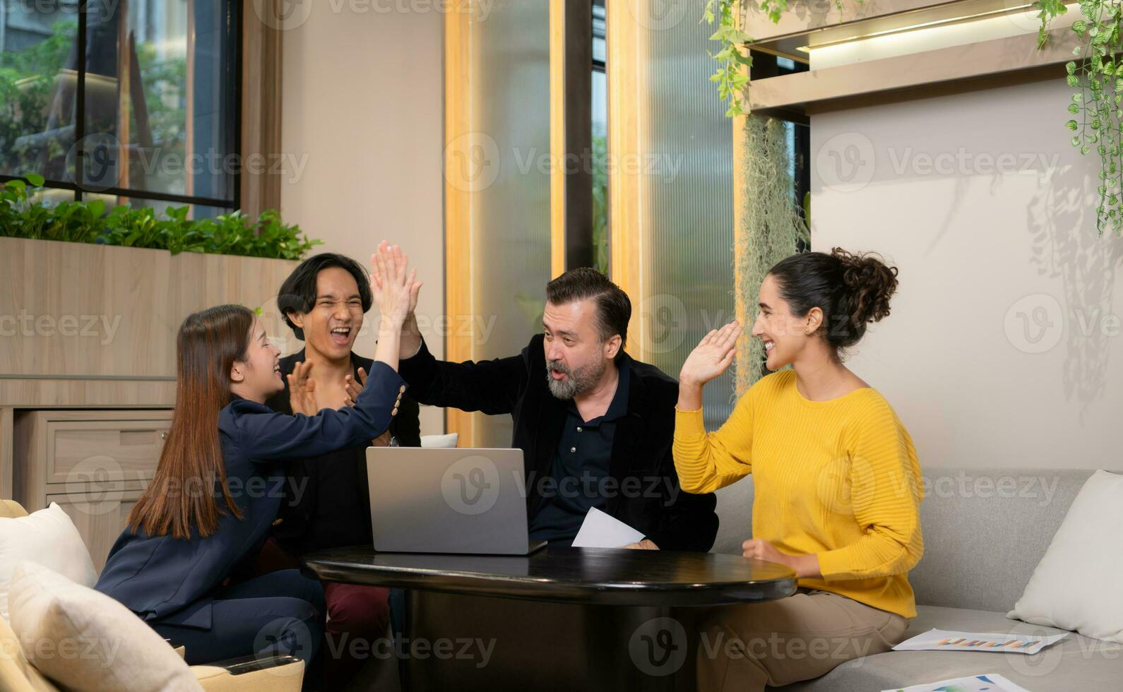 Businessman and businesswoman discussing a project in the meeting room of co-working space photo
