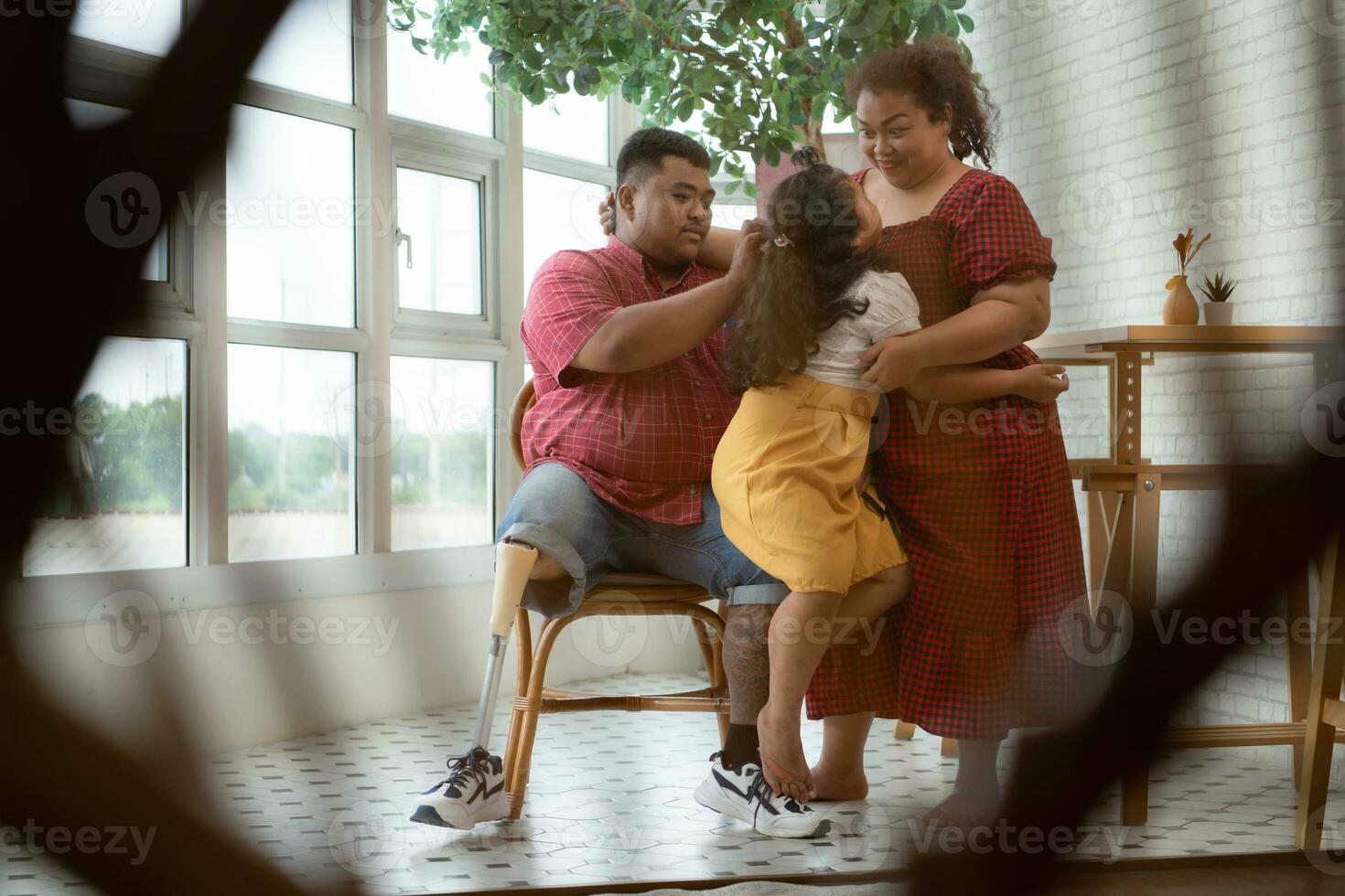 On a new morning, a plus-size family is pleasantly staring out the window. photo