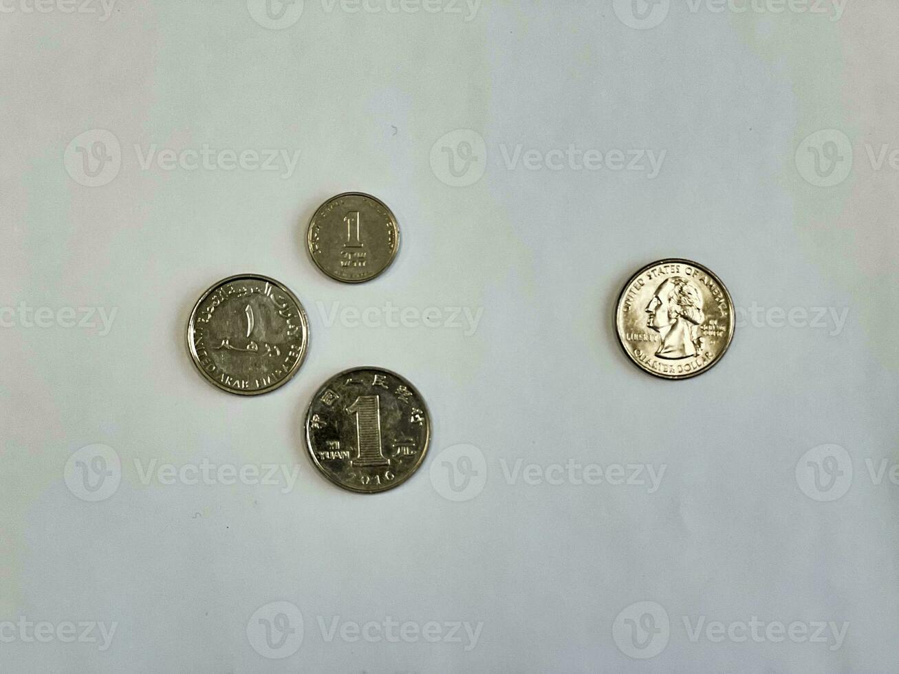 US quarter dollar coin vs one yuan, one dirham and one shekel photo