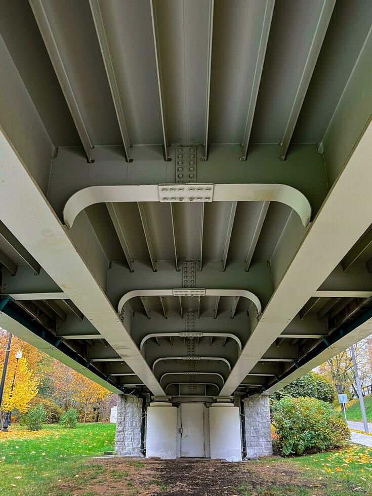 Bottom view of the pedestrian bridge in a park photo