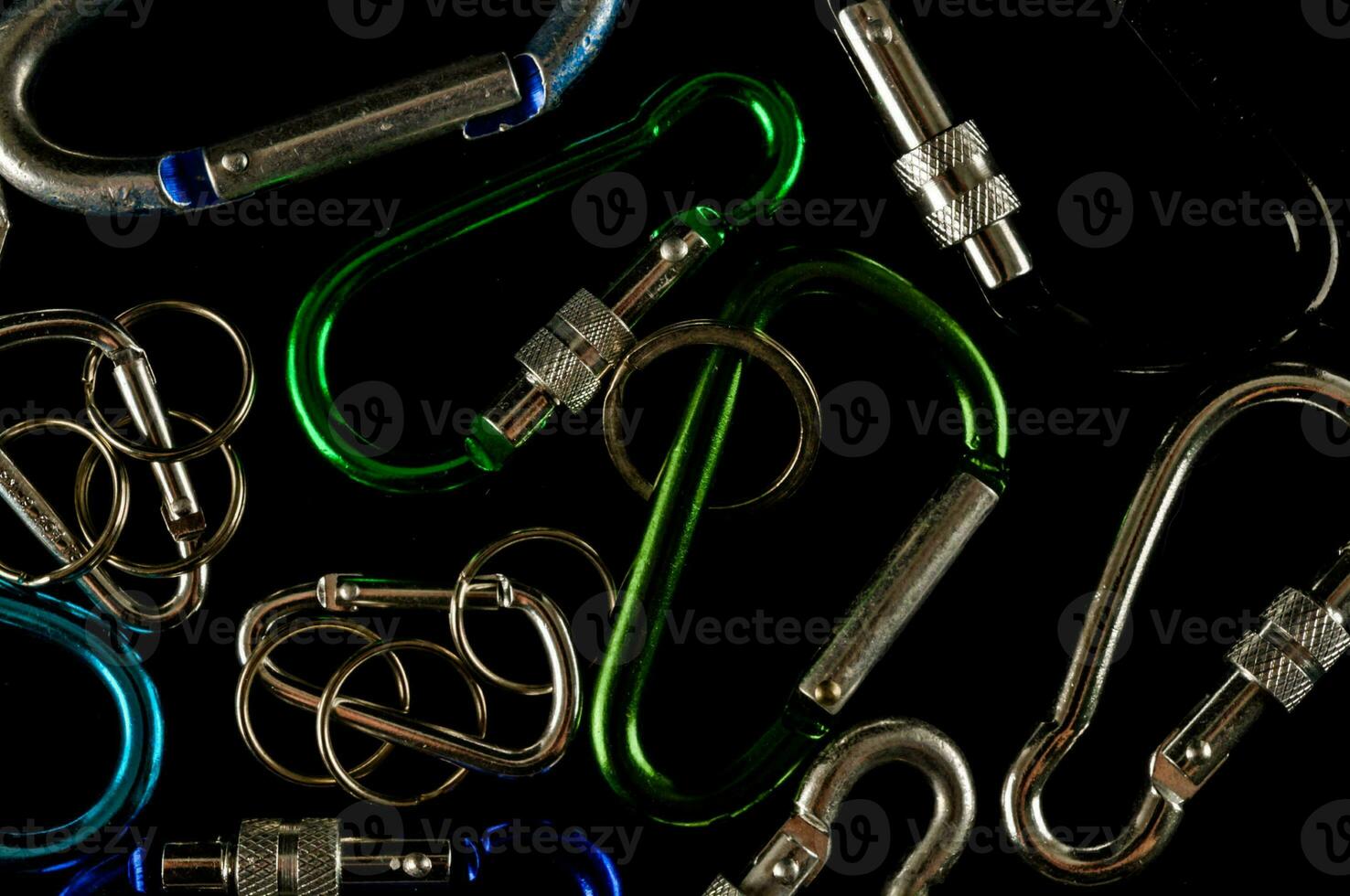 a variety of carabiners are shown photo