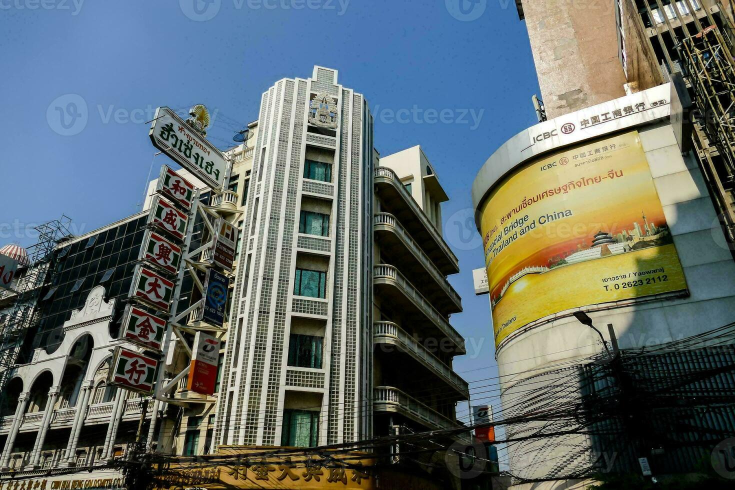 a tall building with a large advertisement on it photo