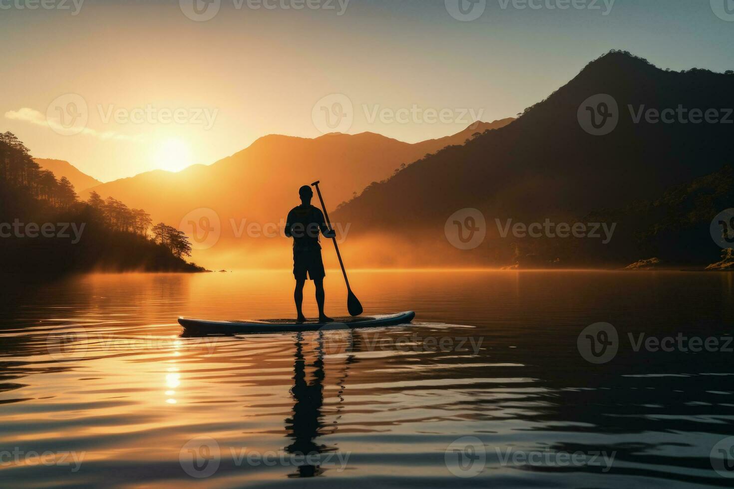 Paddleboarder on serene lake at sunrise background with empty space for text photo