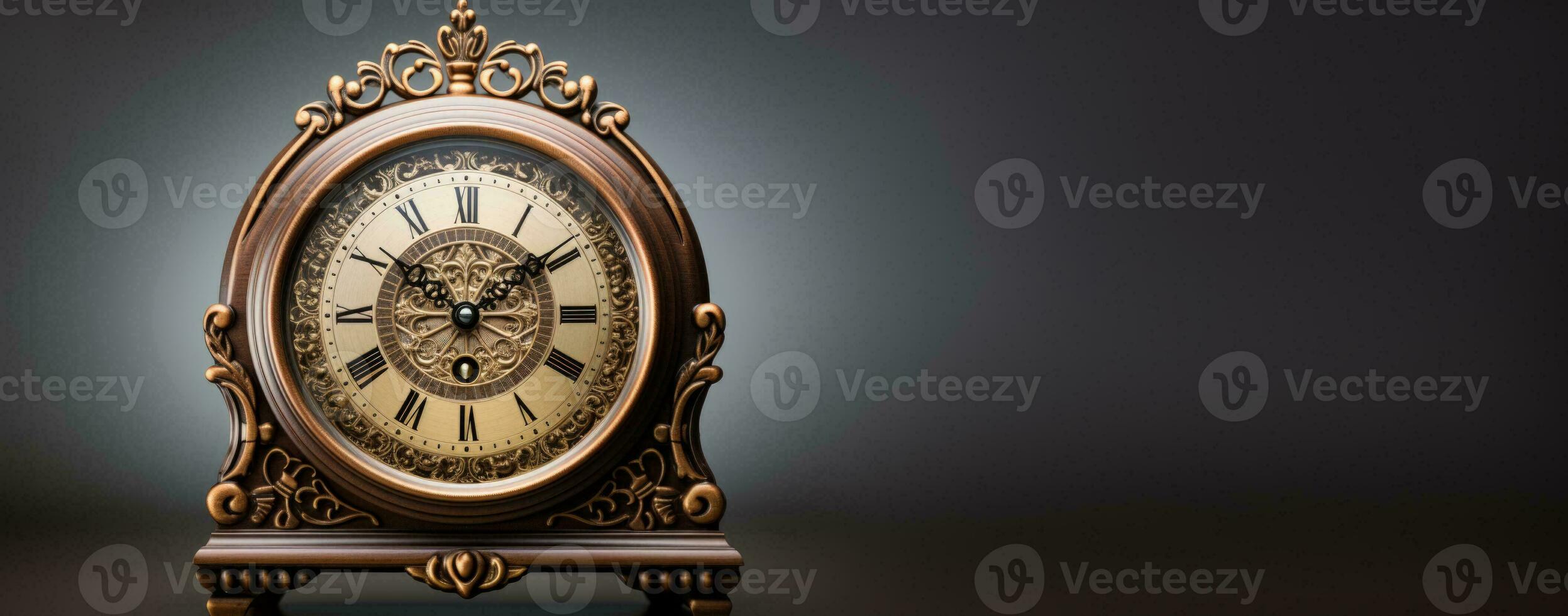 Antique analogue clock striking midnight isolated on a gradient background photo