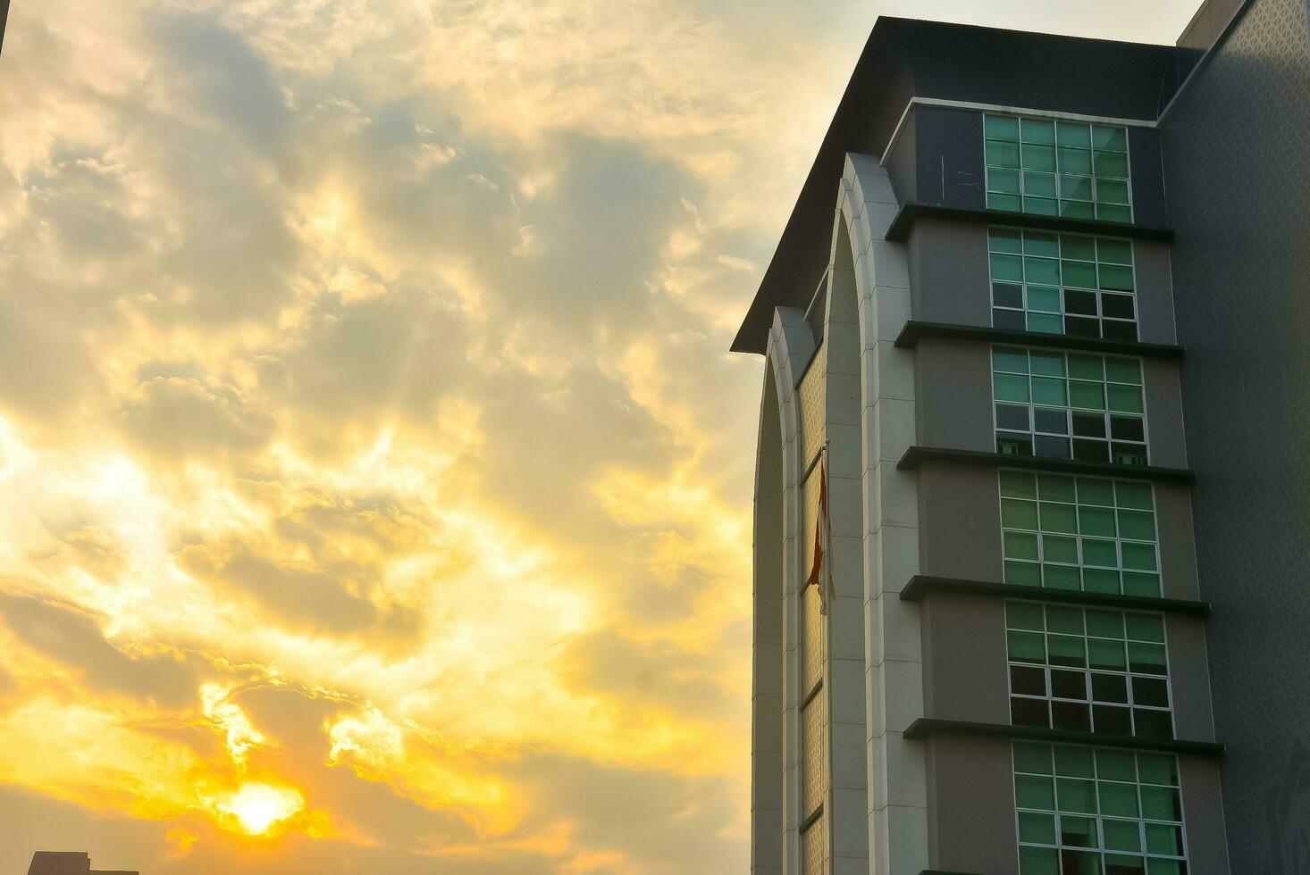 Surabaya, Indonesia - 08-15-2023. amazing sunset view in one of the main buildings at Sunan Ampel State Islamic University UIN. faculty of adab and humanities. photo