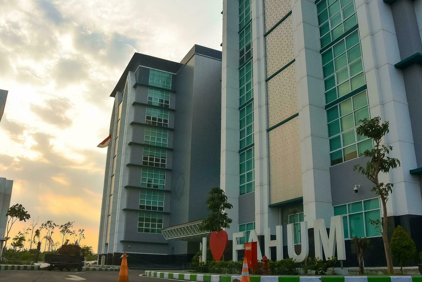 Surabaya, Indonesia - 08-15-2023. amazing sunset view in one of the main buildings at Sunan Ampel State Islamic University UIN, faculty of adab and humanities. photo