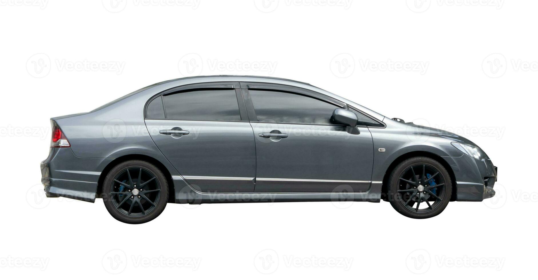 Luxurious dark gray sedan sports car isolated on white background with clipping path. photo